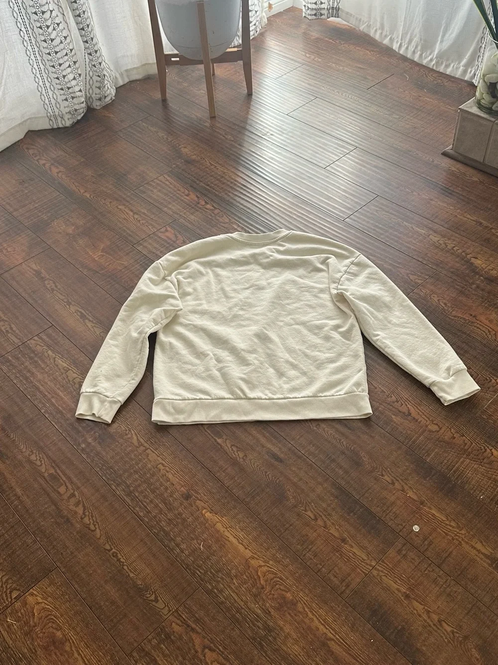 Hello Kitty Cream Crewneck Sweater with Black Star Accents
